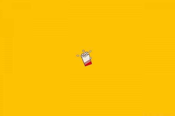 Pop corn na żółtym tle