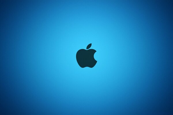 Emblemat apple na niebieskim tle