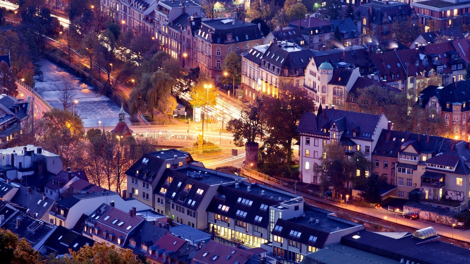 miasta podróże wieczór architektura dom zmierzch droga miasto podświetlany światło ulica miejski system transportu miasto na zewnątrz ruch samochód centrum miasta skyline
